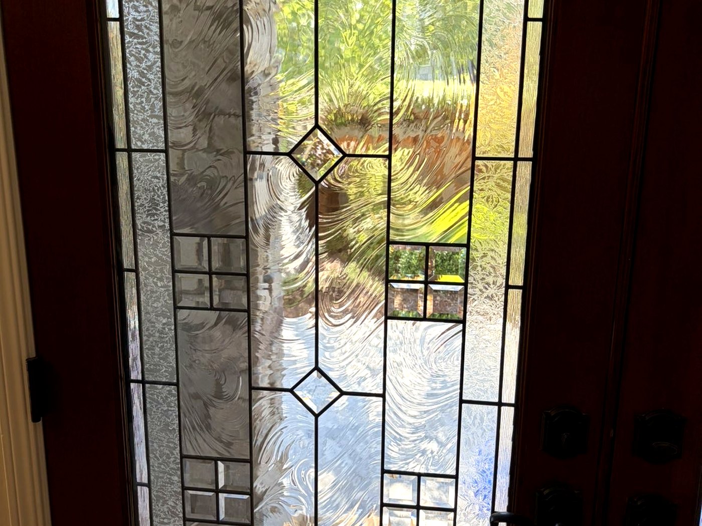 Leaded-glass entry door after cleaning, from inside
